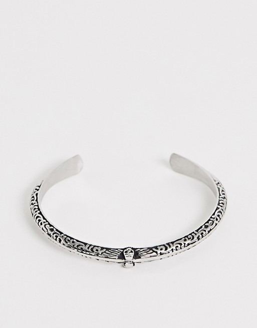 Seven London silver cuff bracelet with skull detail
