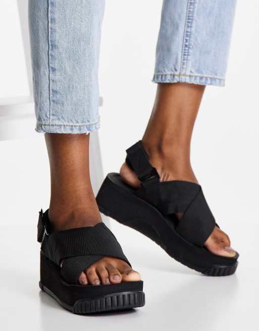 Shaka Fiesta platform sandals with crossover strap in black