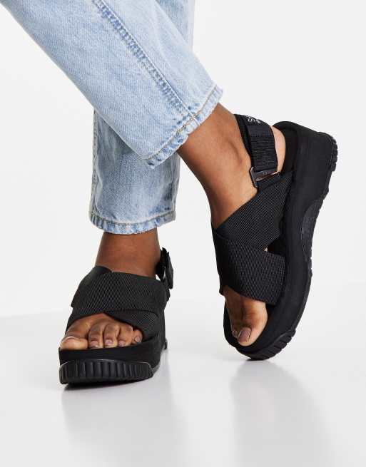 Shaka Fiesta platform sandals with crossover strap in black