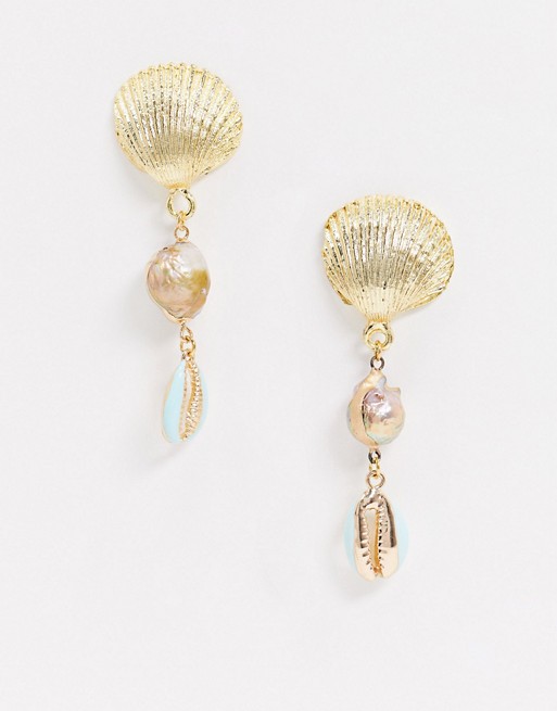 Shashi mermaid shell earrings in gold and pearl