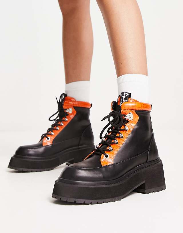 Shellys London Aster chunky combat boots in black and orange