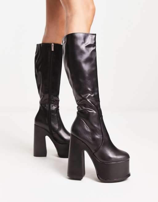 Shellys London Corrs platform knee boots in black stretch | ASOS