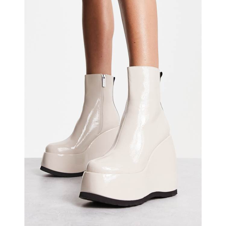 Shellys London Roxanne wedge boots in cream patent