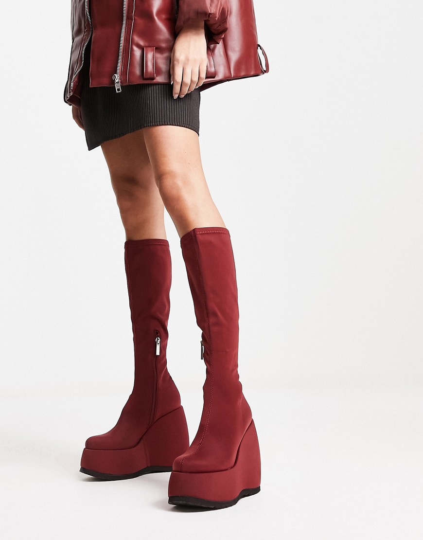 Shelly’s London wedge knee boots in red stretch scuba