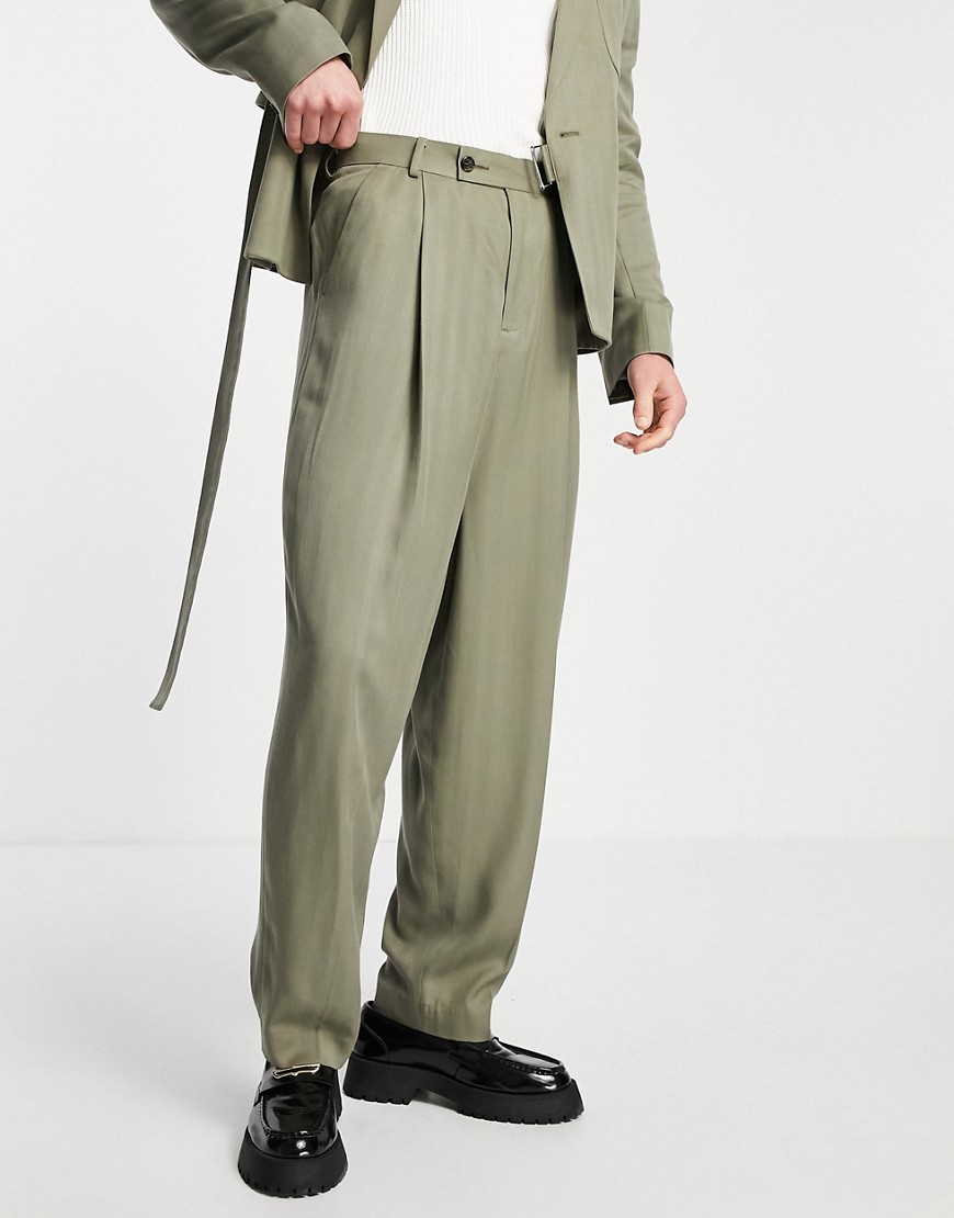 фото Широкие брюки оливкового цвета с завышенной талией и узором «елочка» asos design-зеленый цвет