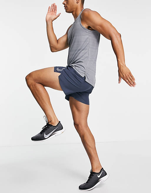 Hombre Pantalones cortos | Shorts azules Run Division Challenger de Nike Running - KI34818
