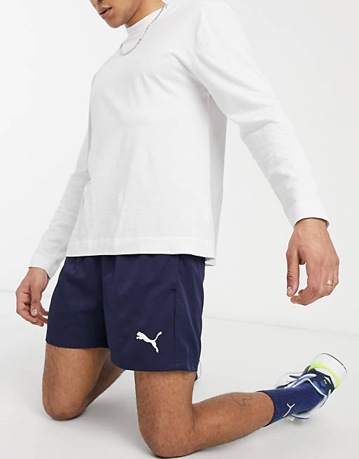 Hombre Pantalones cortos | Shorts de 5 pulgadas azul marino con logo entretejido de Puma Essentials - ON49008