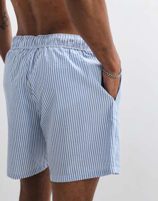Shorts de baño a rayas azules de largo medio de sirsaca de ASOS DESIGN (parte de un conjunto), 5 de 7