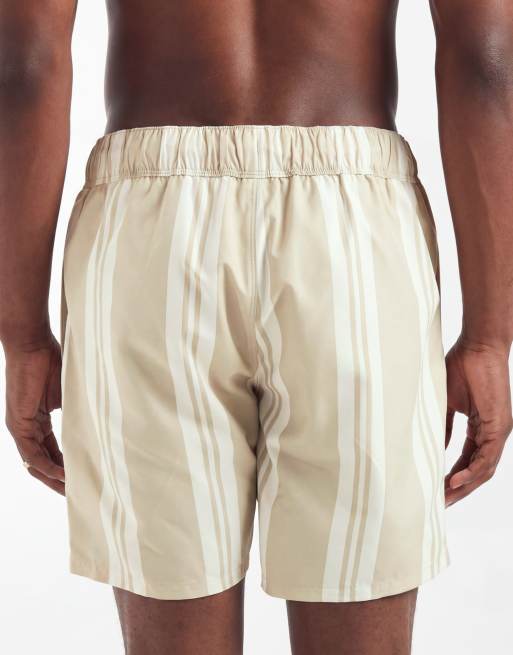 Shorts de baño a rayas beis de largo medio de ASOS DESIGN, 5 de 5