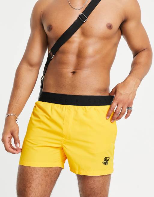 Shorts baño amarillos corte estándar SikSilk | ASOS