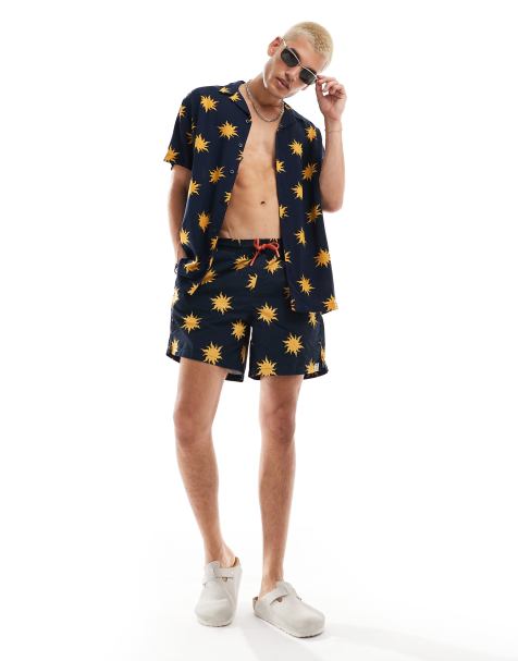 Shorts de baño azul marino con estampado de soles ondulados de Hunky Trunks (parte de un conjunto) - view 1