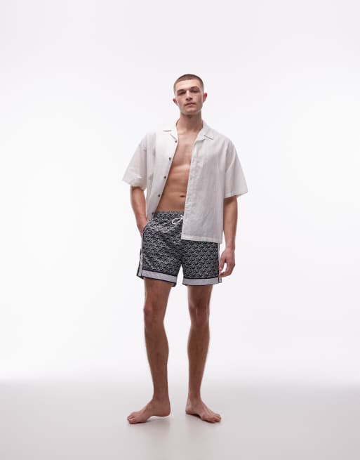 Shorts de baño azul marino con estampado integral y cordón ajustable de Tommy Hilfiger , 2 de 5