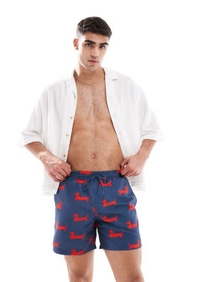 Shorts de baño azul marino con estampado rojo de perros Colbert