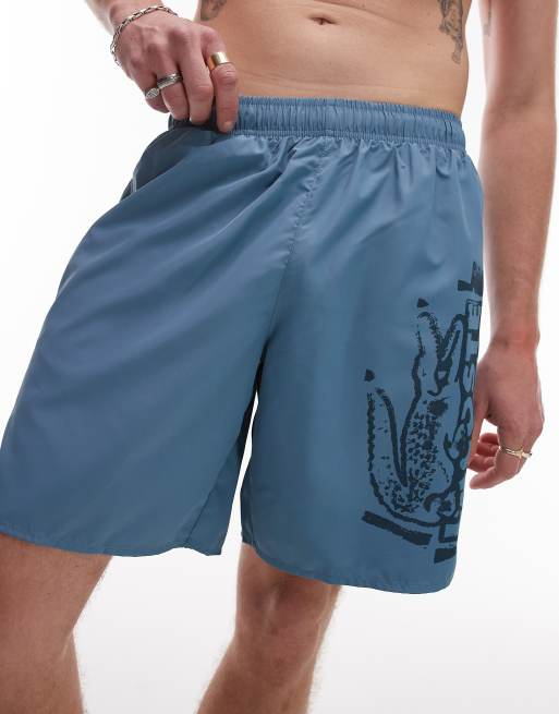 Shorts de baño azules con estampado gráfico de Lacoste, 2 de 4