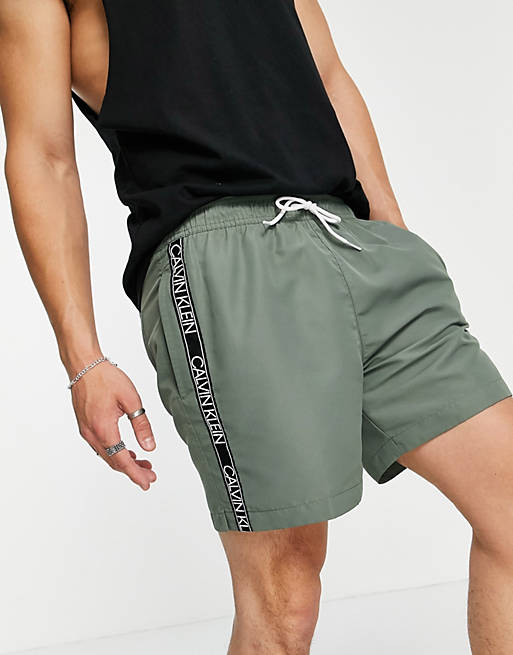 Puede ser calculado Favor hogar Shorts de baño caqui de largo medio con cordón ajustable de Calvin Klein |  ASOS