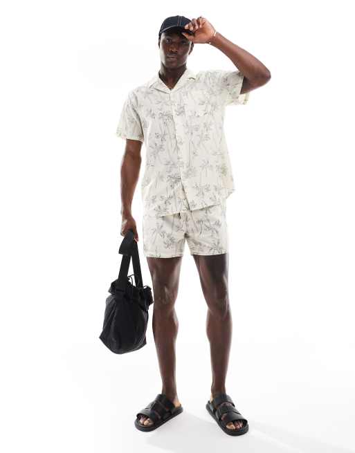 Shorts de baño color crema con estampado de palmeras de South Beach