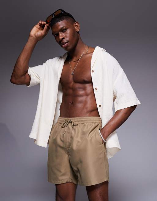 Shorts de baño color piedra oscuro de largo medio de ASOS DESIGN