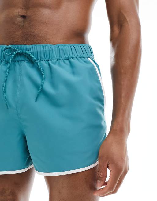 Shorts de baño cortos azules de estilo deportivo de ASOS DESIGN, 4 de 4
