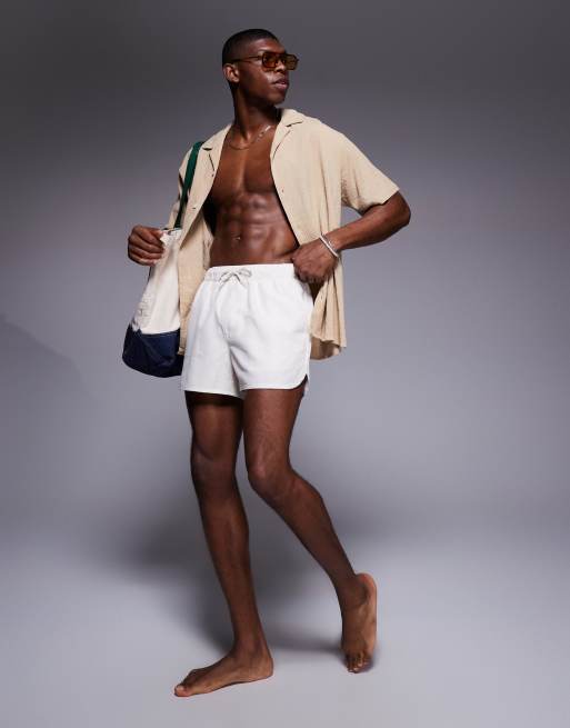 Shorts de baño cortos blancos de estilo deportivo de ASOS DESIGN, 3 de 4