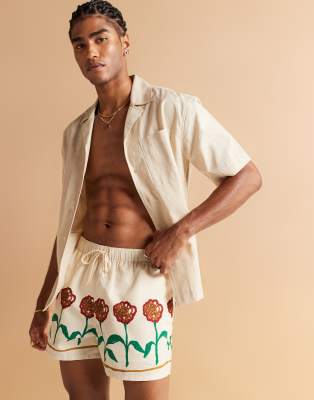 Shorts de baño cortos color piedra con estampado floral de ASOS DESIGN