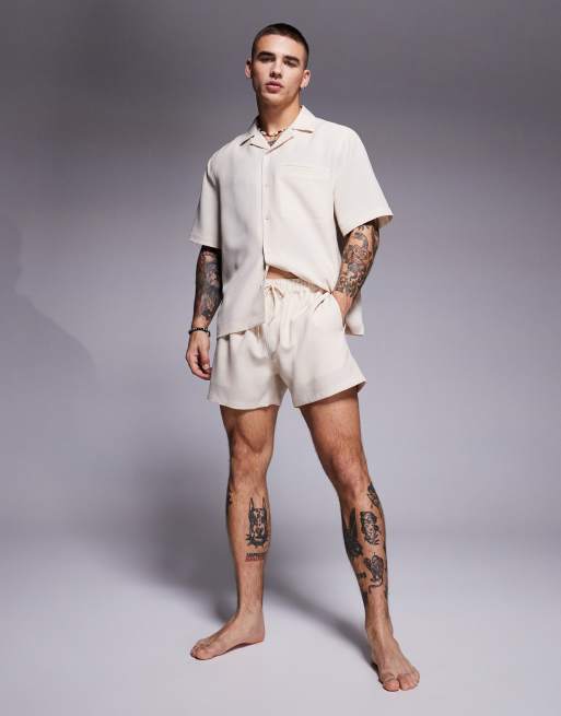 Shorts de baño cortos color piedra de tejido efecto lino de ASOS DESIGN (parte de un conjunto)