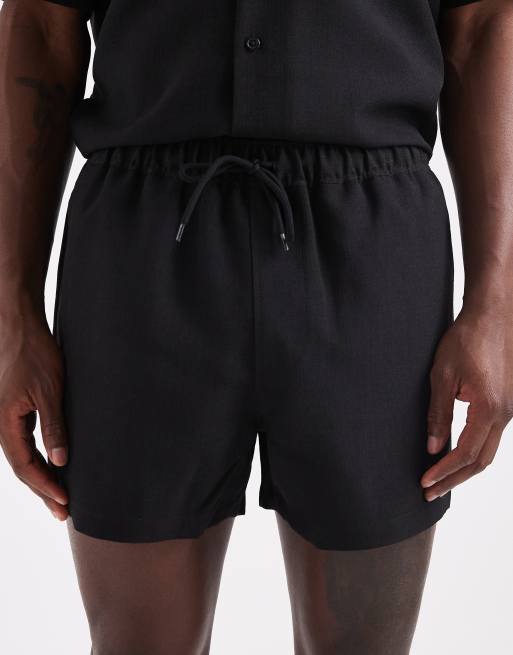 Shorts de baño cortos negros de tejido efecto lino de ASOS DESIGN (parte de un conjunto), 5 de 6