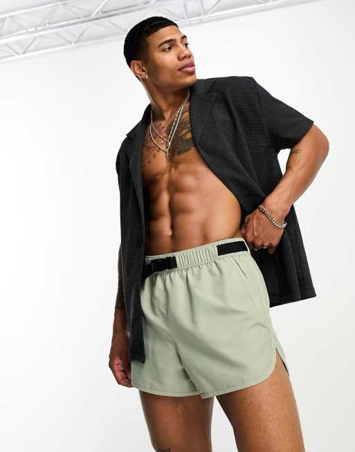 Shorts de baño cortos verde claro de ASOS DESIGN