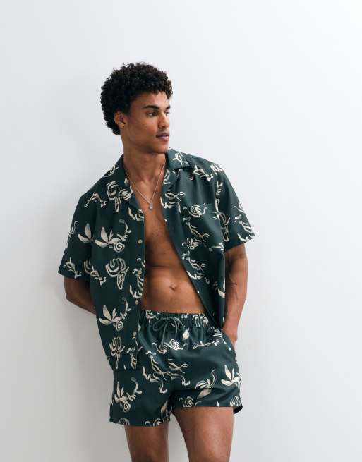 Shorts de baño cortos verdes con diseño estampado de tejido efecto lino de ASOS DESIGN (parte de un conjunto), 2 de 9