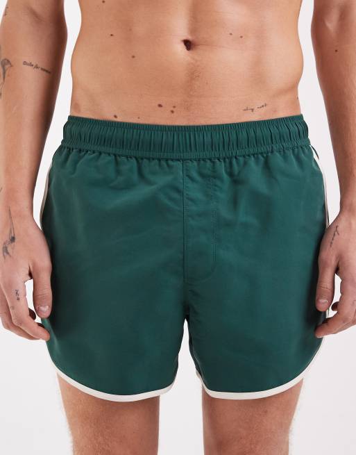 Shorts de baño cortos verdes con ribetes en contraste de ASOS DESIGN, 4 de 5