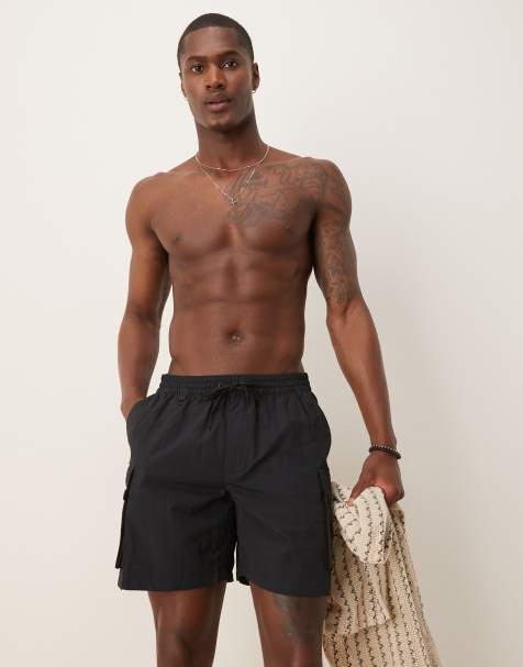Shorts de baño de 7" negros con bolsillos Volley de Nike - view 1