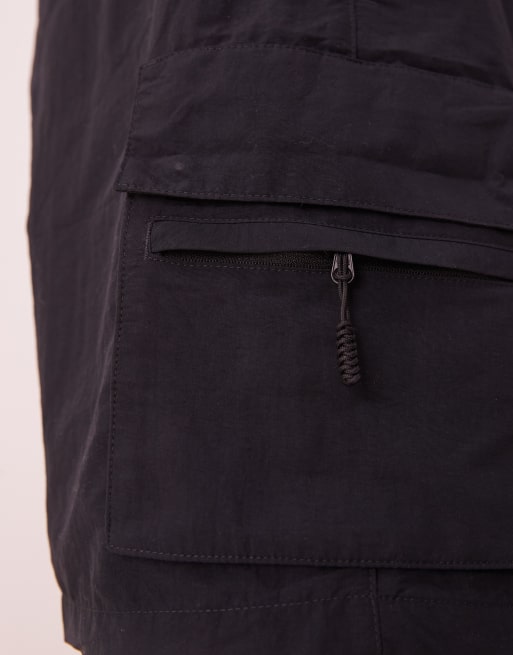 Shorts de baño de 7" negros con bolsillos Volley de Nike, 3 de 4