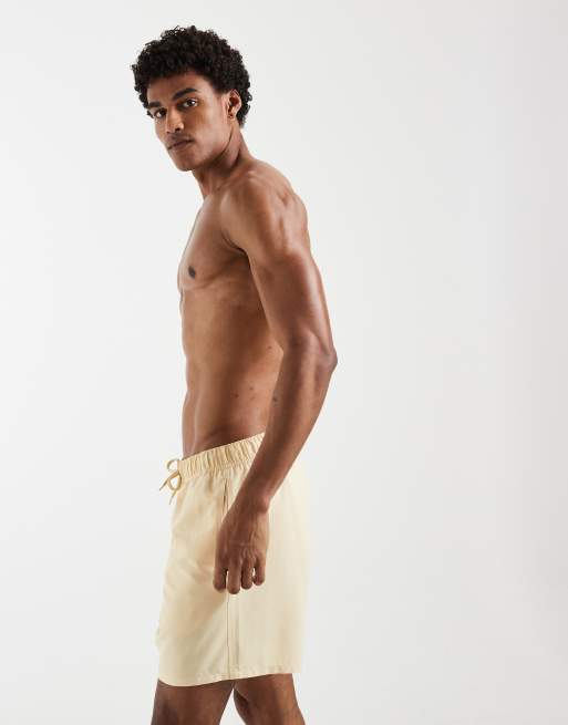 Shorts de baño de largo medio amarillos de ASOS DESIGN, 4 de 5