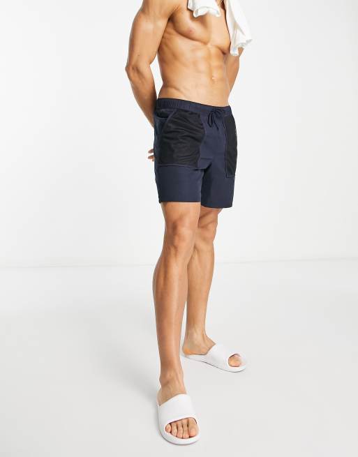 Shorts de baño de largo medio azul marino con bolsillos de malla de ASOS DESIGN, 2 de 4