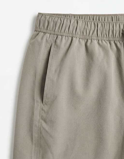 Shorts de baño de largo medio caquis de ASOS DESIGN, 8 de 9