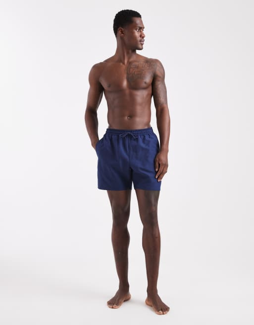 Shorts de baño de largo medio en azul marino de ASOS DESIGN, 2 de 5