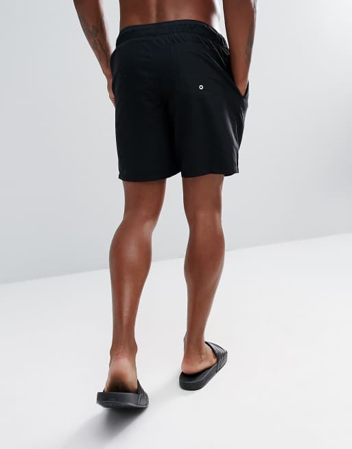 Shorts de baño de largo medio en negro de ASOS DESIGN, 2 de 4