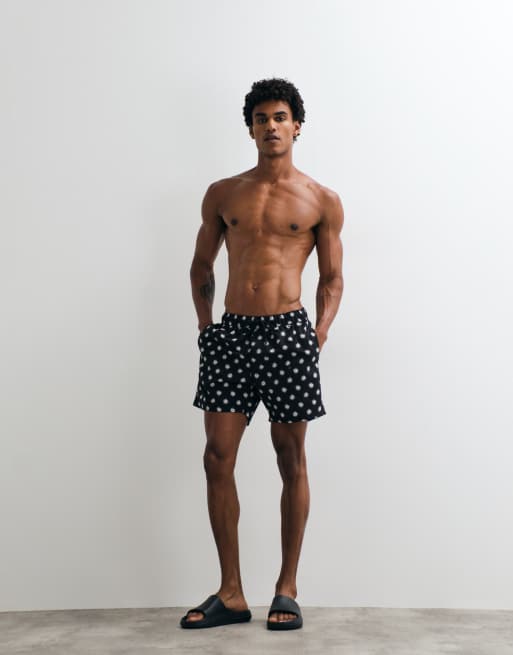 Shorts de baño de largo medio negros con diseño estampado de ASOS DESIGN, 3 de 5
