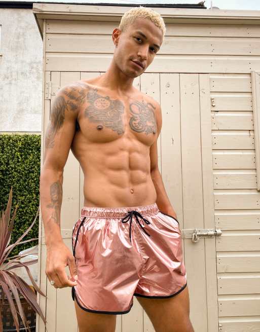 Shorts de baño estilo corredor en dorado rosa metalizado con ribetes en contraste de ASOS DESIGN