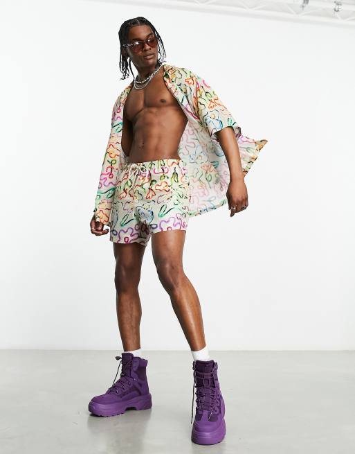 Shorts de bano muy cortos con estampado floral de ASOS DESIGN parte de un conjunto ASOS