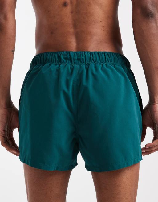 Shorts de baño muy cortos verde oscuro de ASOS DESIGN, 5 de 5