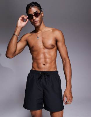 Shorts de baño negros con emblema Reactive de The Couture Club - view 1