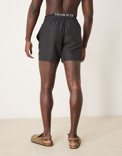 Shorts de baño negros con logo en la cinturilla de Calvin Klein, 4 de 4