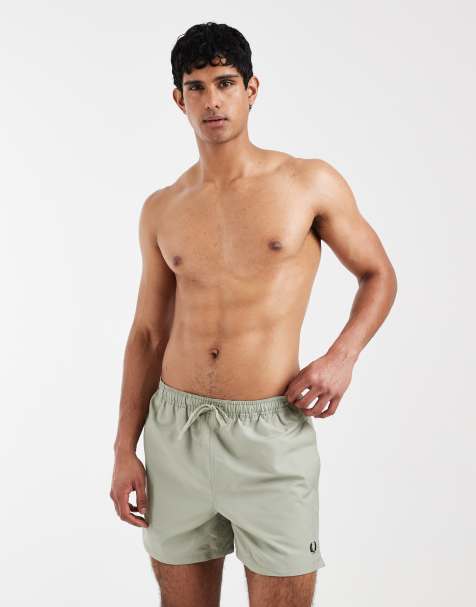 Shorts de baño verde pálido con cordón ajustable y logo de Fred Perry - view 1
