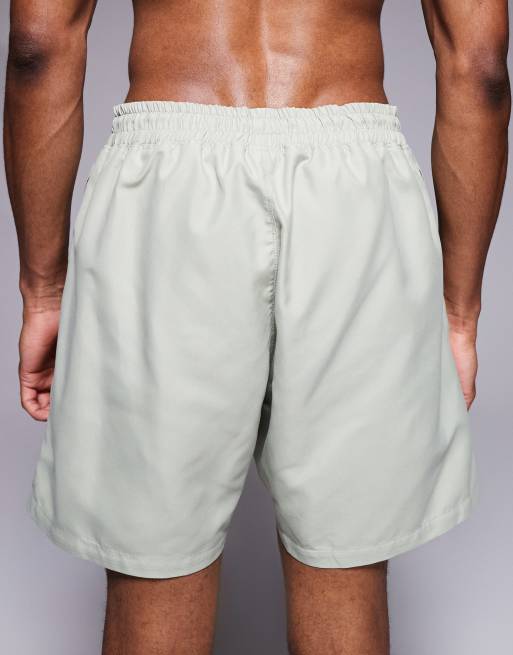 Shorts de baño verde salvia de largo medio de ASOS DESIGN, 4 de 5