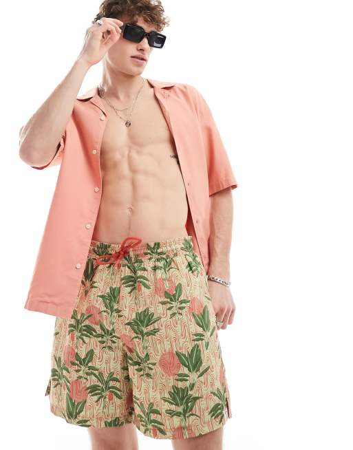 Shorts de baño verdes con estampado de palmeras de tejido texturizado de Hunky Trunks