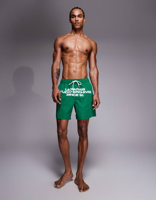 Shorts de baño verdes de largo medio con estampado posicional de ASOS DESIGN, 2 de 5