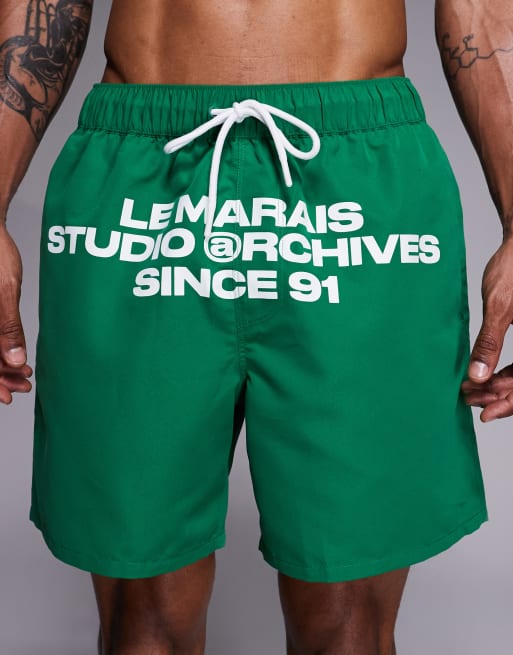 Shorts de baño verdes de largo medio con estampado posicional de ASOS DESIGN, 5 de 5