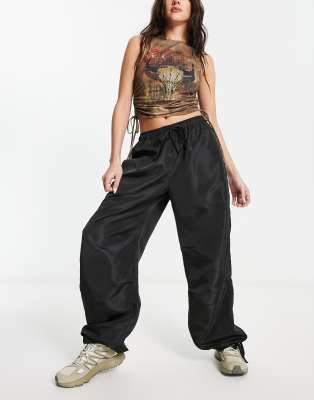 oversized nylon cargo pants in black