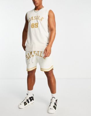 Siksilk co-ord basketball shorts in beige with pinstripe and varsity print