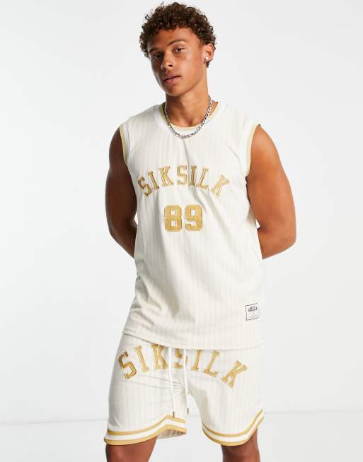 Siksilk co-ord set in beige with pinstripe and varsity print, 2 of 3